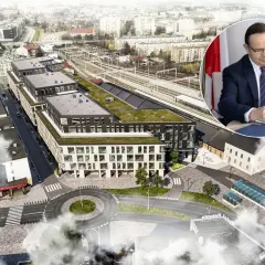 Nowoczesny dworzec autobusowy Rzeszów z zielonymi dachami i otaczającą infrastrukturą. W tle mężczyzna w garniturze podpisuje dokument.